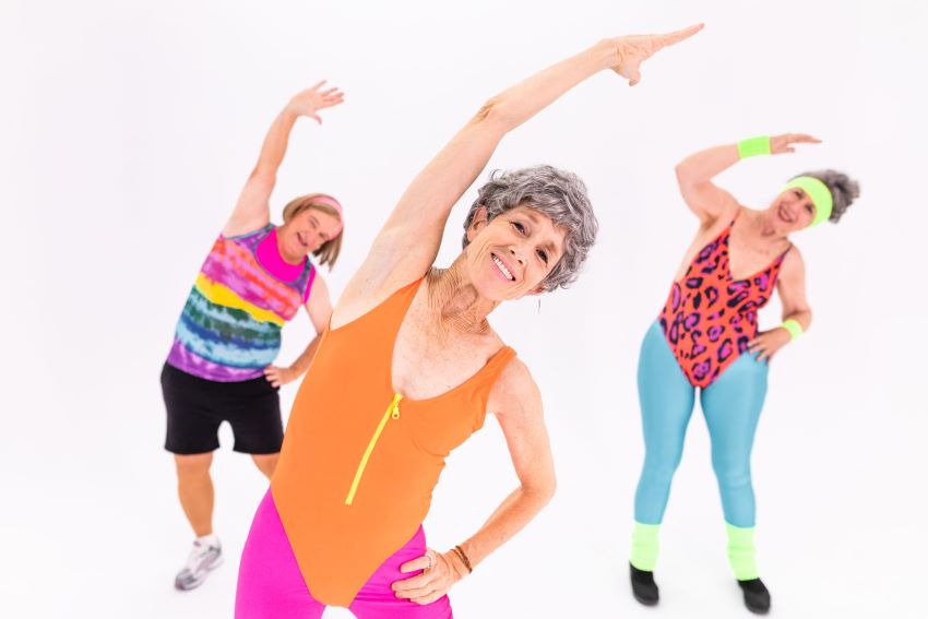 Foto von drei Frauen, die Gymnastik machen